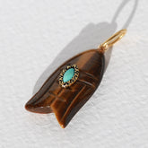 Charm pez ojo de tigre