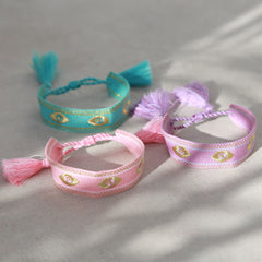 Woven bracelet evil eye pink