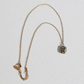 Gold necklace element stone Dalmatian