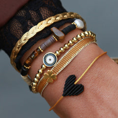Pulsera de oro negro con ojo malvado