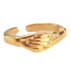 Anillo de manos de oro