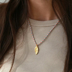 Collar de oro con espíritu hamsa