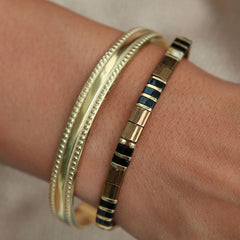 Brazalete de oro con doble punto
