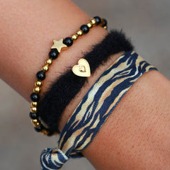 Moraira star bracelet with black stone