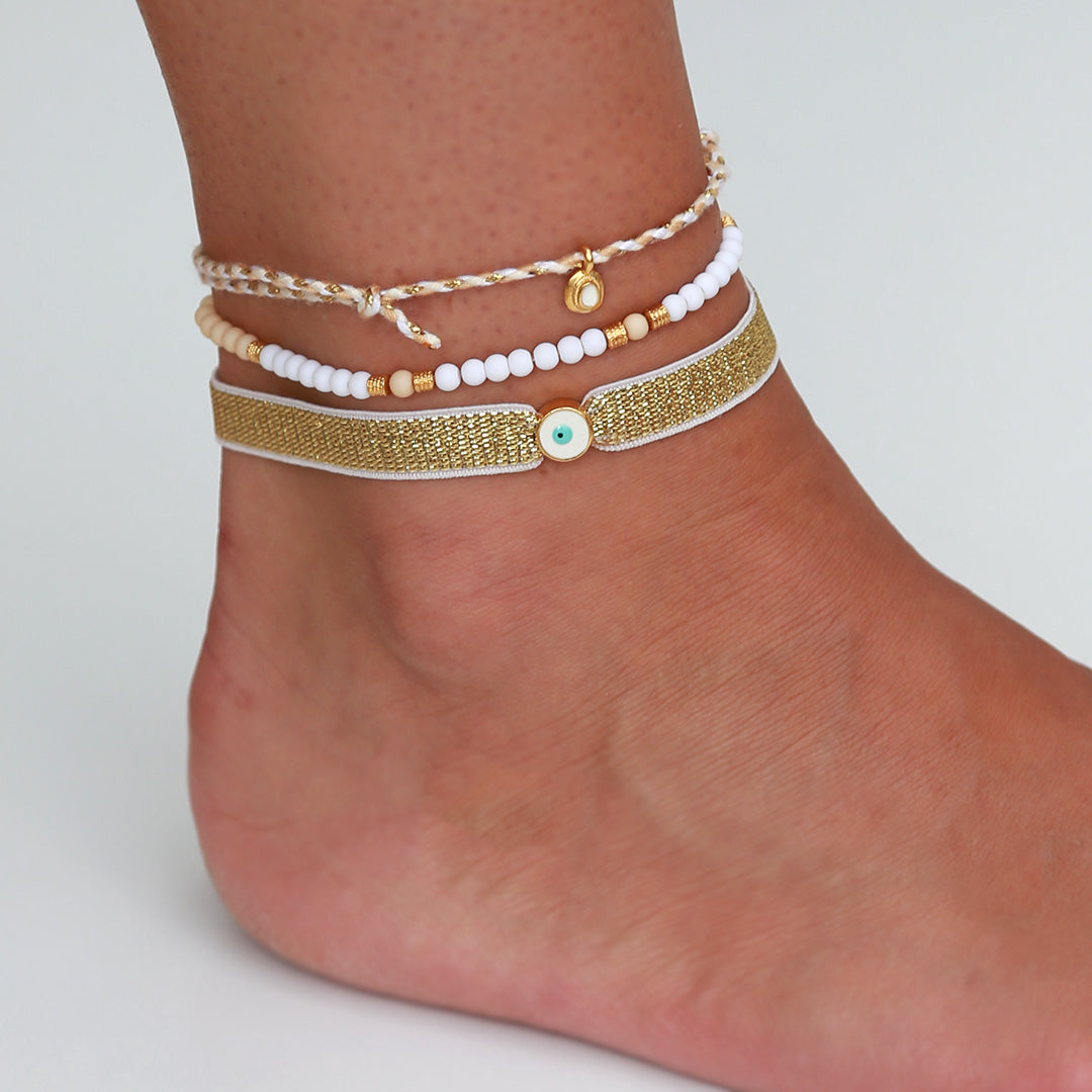 Pulsera de tobillo con ojo malvado dorado