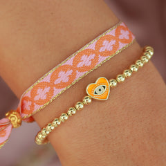 Armband böses Auge orange Herz gold