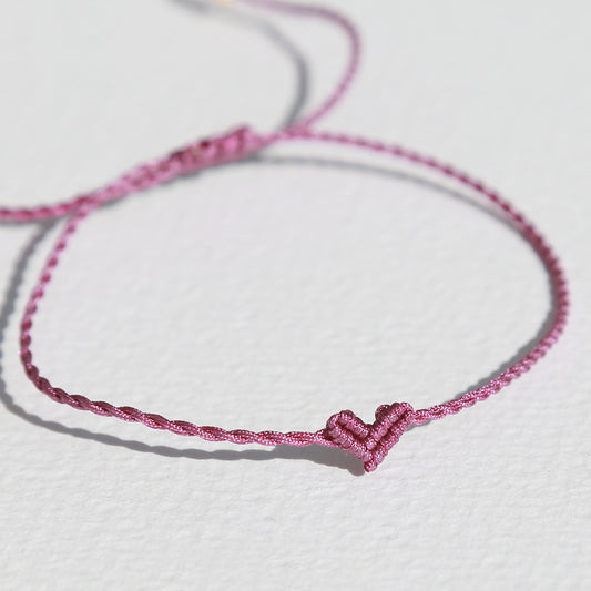Armband klein hart magenta 1080