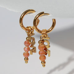 Gold faceted 'Love' earrings – orange