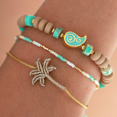 Brazalete palma champán