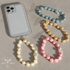 Bijoux de téléphone nœud papillon bleu perle