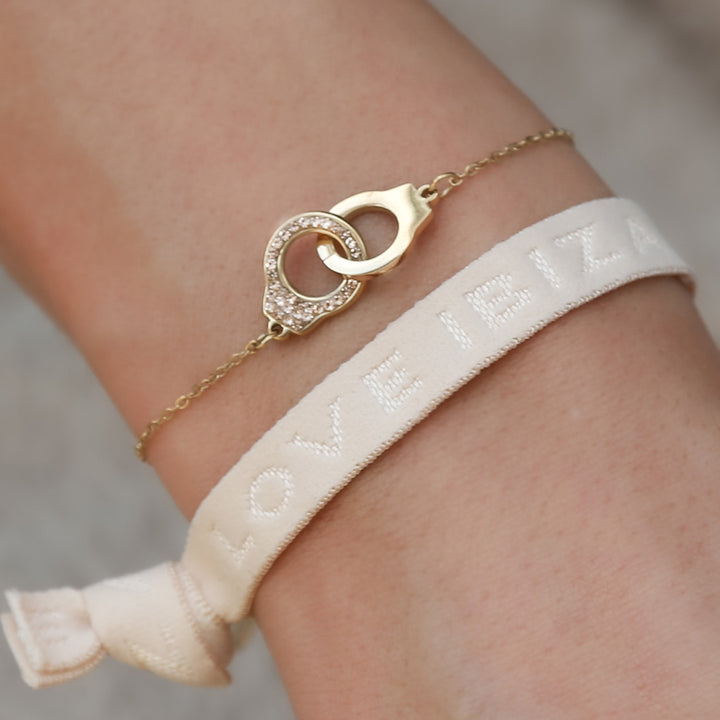 Gold bracelet together