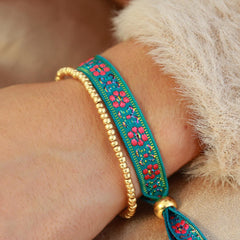Bracelet tissé fleur bleu