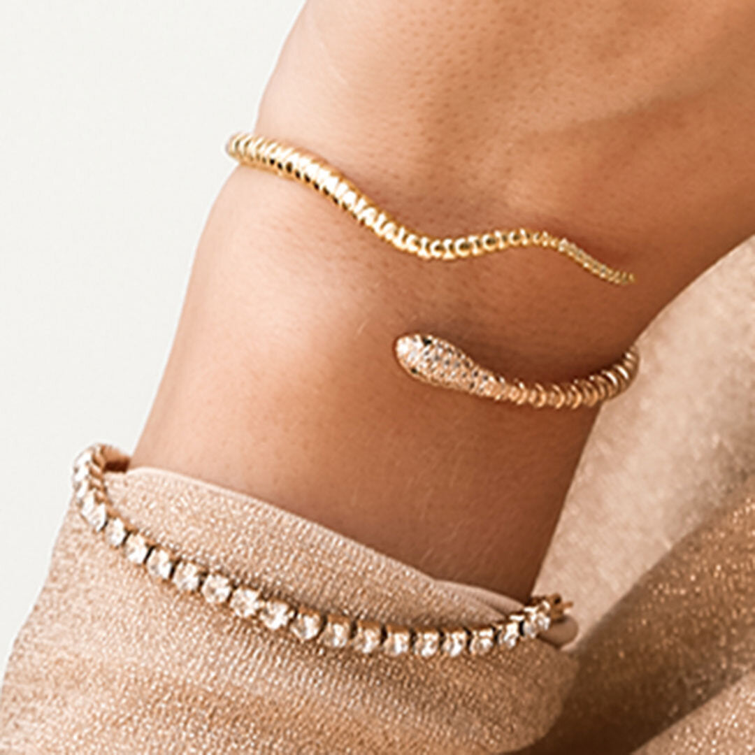 Gold bracelet covered in diamonds